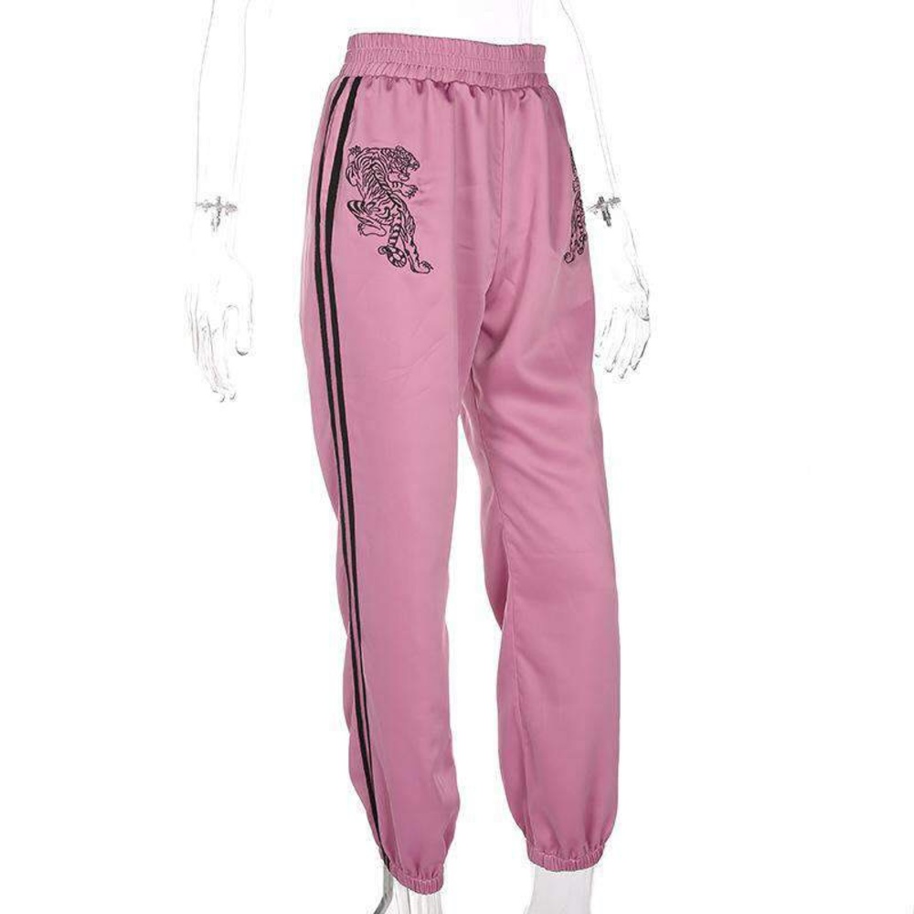 Pink pants with black stripes and tigers